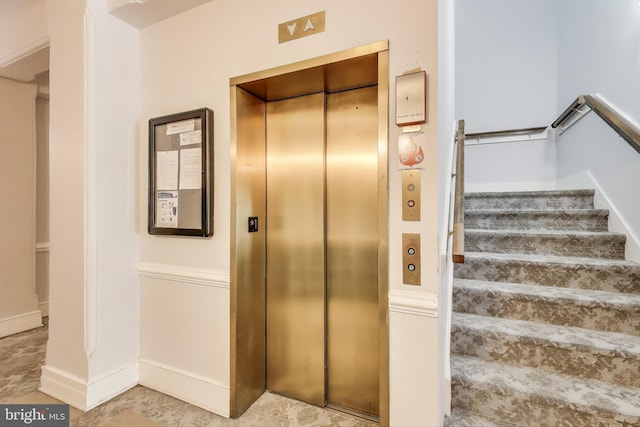 1619 R St NW Unit 501, Washington, DC 20009 - staircase featuring elevator and baseboards