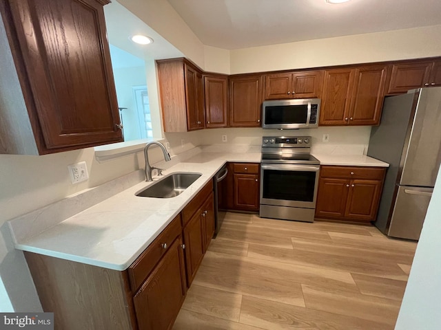 1103 Jousting Way, Mount Airy, MD 21771 - kitchen with appliances with stainless steel finishes, light wood-type flooring, light countertops, and recessed lighting
