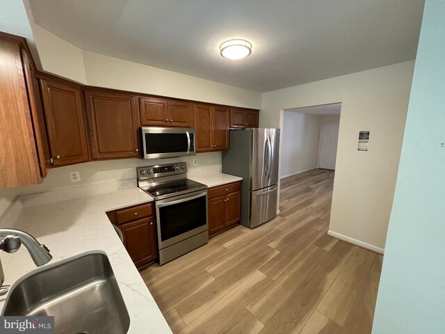 1103 Jousting Way, Mount Airy, MD 21771 - kitchen with stainless steel appliances and light wood-type flooring