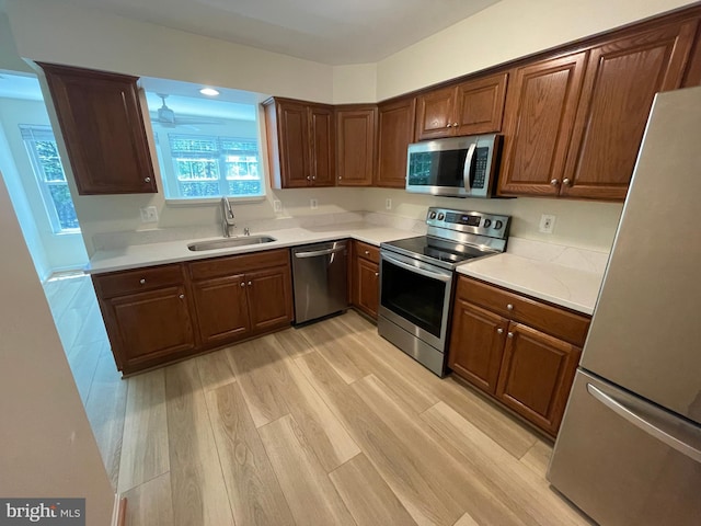 1103 Jousting Way, Mount Airy, MD 21771 - kitchen featuring stainless steel appliances, light wood-style floors, light countertops, and recessed lighting