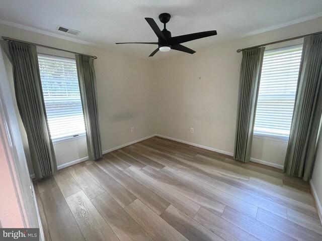 1103 Jousting Way, Mount Airy, MD 21771 - spare room with light wood-style floors, a ceiling fan, and healthy amount of natural light