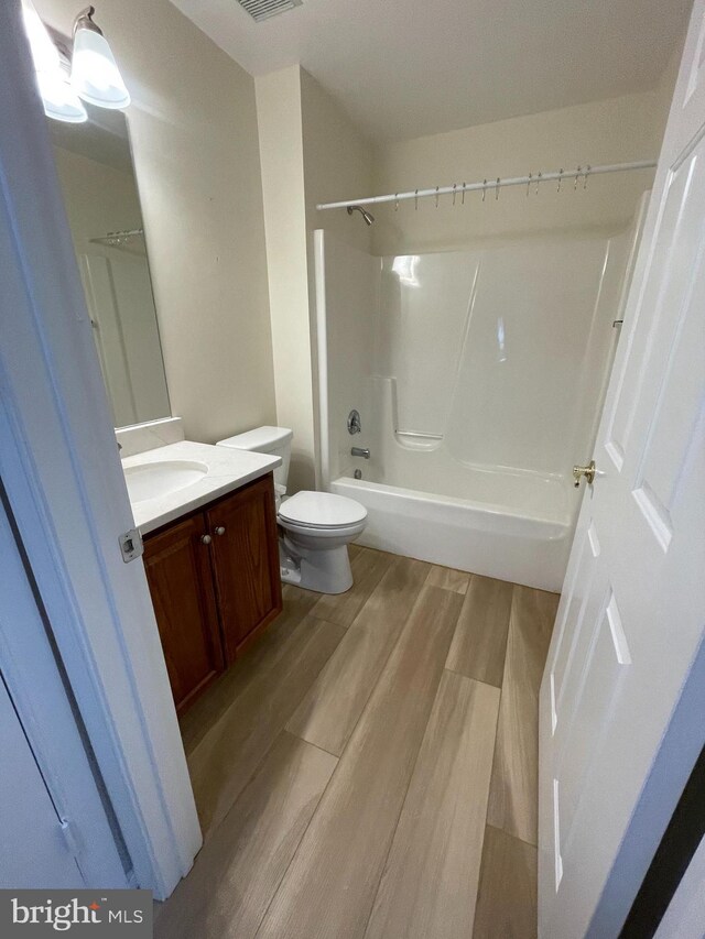 1103 Jousting Way, Mount Airy, MD 21771 - bathroom featuring wood finished floors, vanity, and bathtub / shower combination