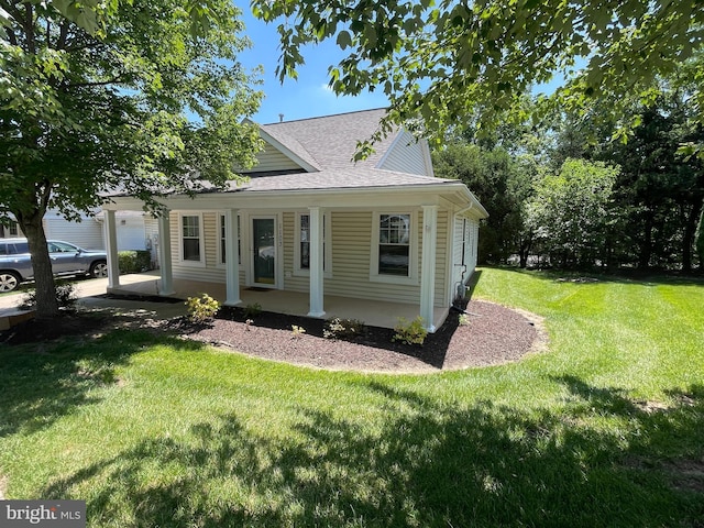 1103 Jousting Way, Mount Airy, MD 21771 - view of front facade with a front yard, roof with shingles, and covered porch