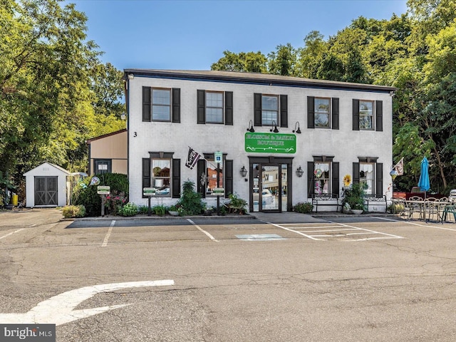 1103 Jousting Way, Mount Airy, MD 21771 - townhome / multi-family property with a storage shed and uncovered parking