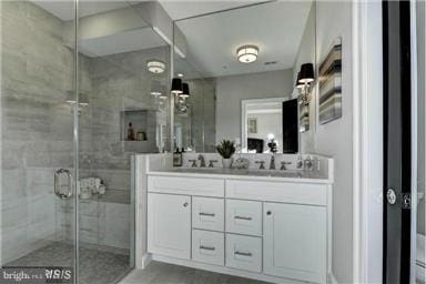 3624 10th St NW Unit 4, Washington, DC 20010 - bathroom with double vanity and a stall shower