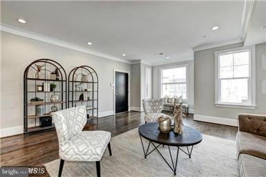 3624 10th St NW Unit 4, Washington, DC 20010 - living area with crown molding, wood finished floors, and recessed lighting