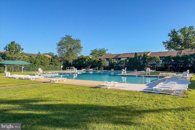 206 Canterbury Ct, Hightstown, NJ 08520 - community pool featuring a lawn