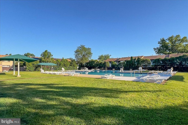 206 Canterbury Ct, Hightstown, NJ 08520 - community pool featuring a lawn