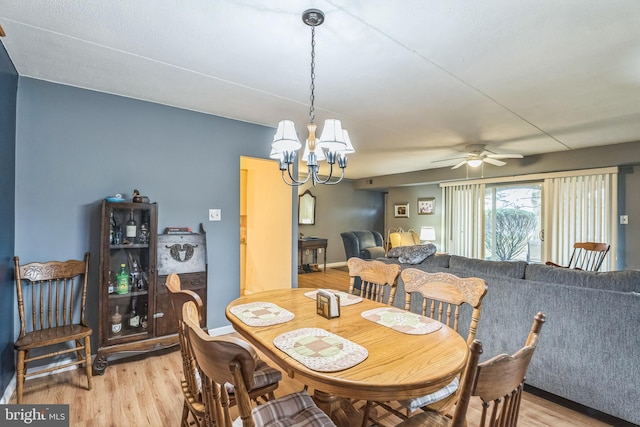 501 N Bethlehem Pike Unit 14-Q, Ambler, PA 19002 - dining room featuring light wood-type flooring, a chandelier, and a ceiling fan