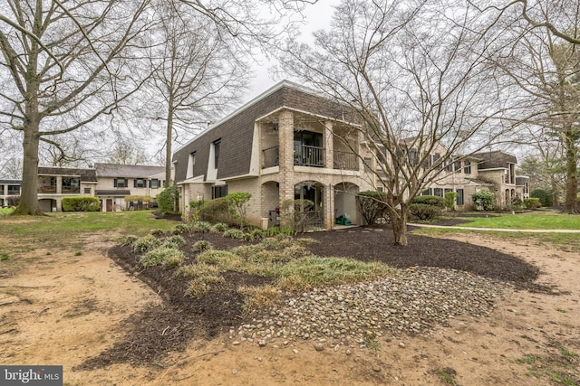 501 N Bethlehem Pike Unit 14-Q, Ambler, PA 19002 - view of front of home with a balcony and brick siding