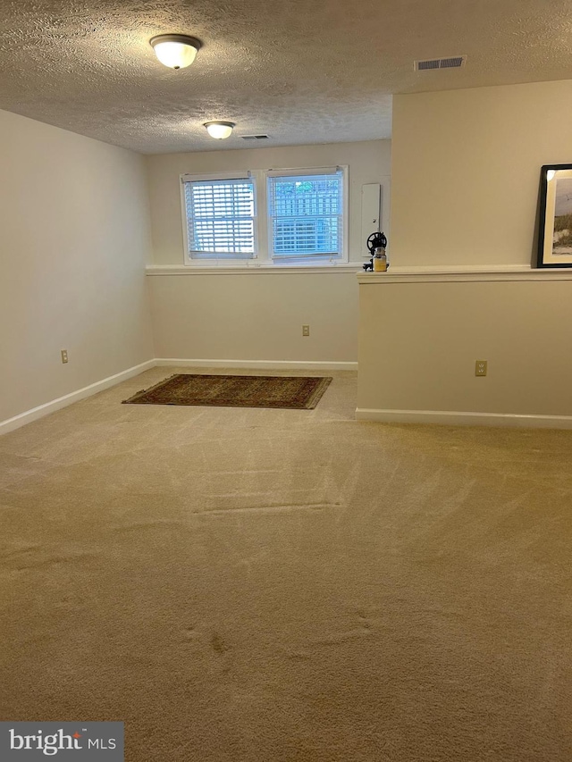 15496 Travailer Ct, Woodbridge, VA 22193 - carpeted spare room featuring a textured ceiling