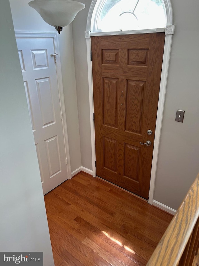 15496 Travailer Ct, Woodbridge, VA 22193 - entrance foyer with baseboards and light wood-style flooring
