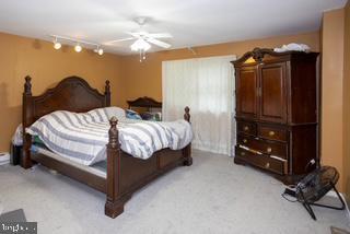 3782 Grandview Ave, Bensalem, PA 19020 - bedroom with light carpet and ceiling fan