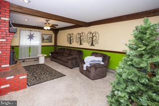 3782 Grandview Ave, Bensalem, PA 19020 - living area featuring beam ceiling, ceiling fan, and a fireplace