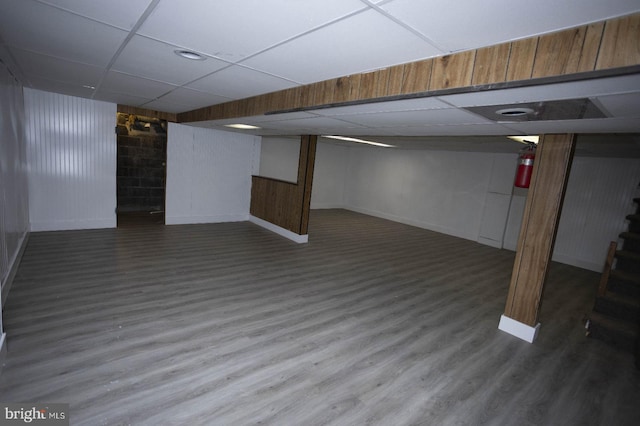 3782 Grandview Ave, Bensalem, PA 19020 - finished basement with a paneled ceiling, wood finished floors, and concrete block wall