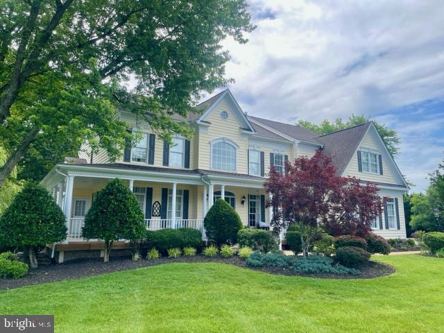 13501 Zachary Taylor Ct, Manassas, VA 20112 - view of front of home featuring covered porch and a front yard