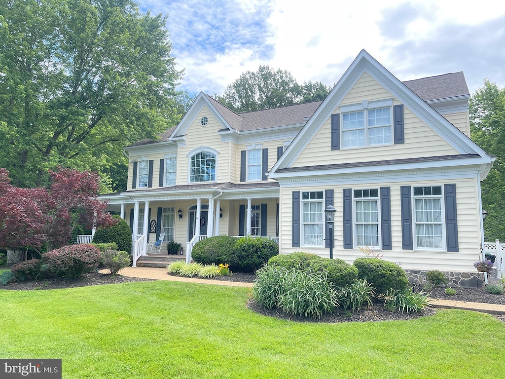 13501 Zachary Taylor Ct, Manassas, VA 20112 - view of front facade featuring covered porch and a front yard