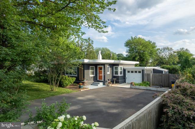 8102 Douglas Rd, Glenside, PA 19038 - view of front of property with a garage and asphalt driveway