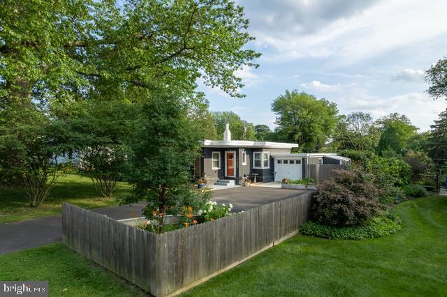 8102 Douglas Rd, Glenside, PA 19038 - rear view of property with an attached garage