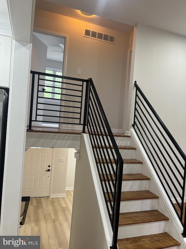 63 Baker Blvd, Marlton, NJ 08053 - stairway with wood finished floors and baseboards