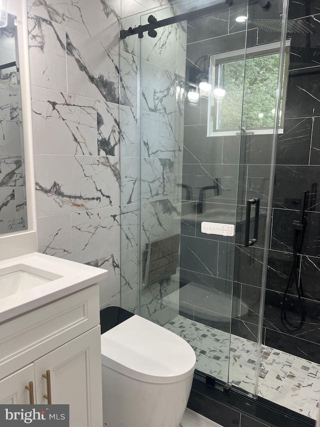 63 Baker Blvd, Marlton, NJ 08053 - full bathroom featuring vanity, a stall shower, and tile walls
