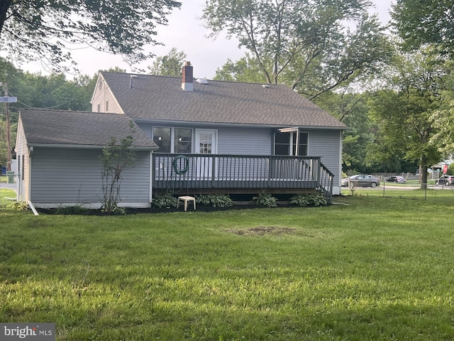 63 Baker Blvd, Marlton, NJ 08053 - back of house featuring a wooden deck, a chimney, a yard, and roof with shingles