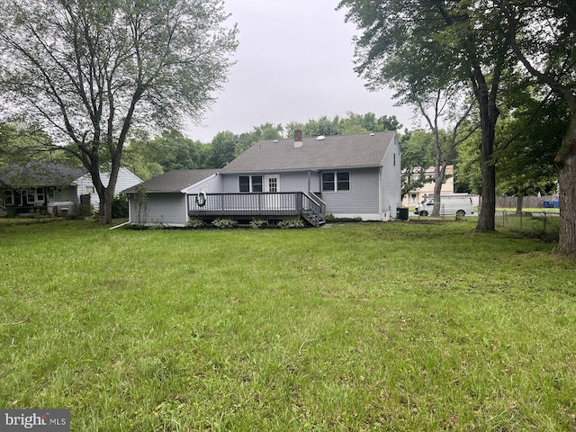 63 Baker Blvd, Marlton, NJ 08053 - rear view of house with a deck, a shingled roof, and a chimney