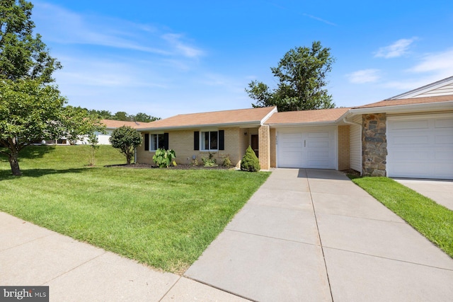3533 Fitzhugh Ln Unit 77-A, Silver Spring, MD 20906 - ranch-style house with an attached garage, a front yard, concrete driveway, brick siding, and stone siding