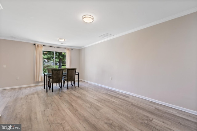 3533 Fitzhugh Ln Unit 77-A, Silver Spring, MD 20906 - dining area featuring light wood finished floors and ornamental molding