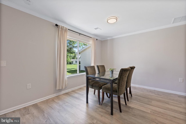 3533 Fitzhugh Ln Unit 77-A, Silver Spring, MD 20906 - dining space with crown molding and light wood-type flooring