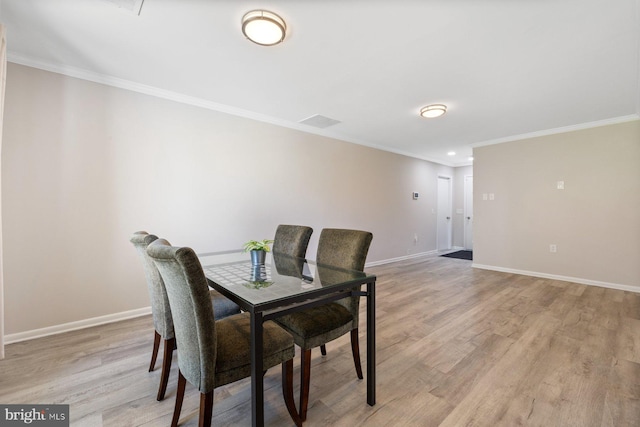 3533 Fitzhugh Ln Unit 77-A, Silver Spring, MD 20906 - dining room featuring light wood-style flooring and crown molding