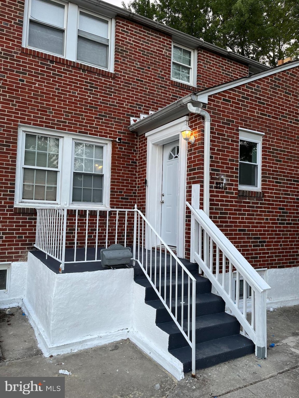 2210 Echodale Ave, Baltimore, MD 21214 - property entrance featuring brick siding