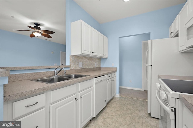 34704 Villa Cir Unit 1307, Lewes, DE 19958 - kitchen with white appliances, ceiling fan, white cabinetry, backsplash, and light countertops