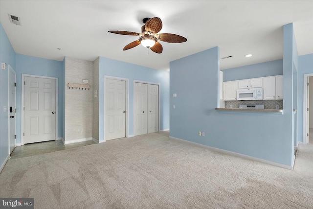 34704 Villa Cir Unit 1307, Lewes, DE 19958 - unfurnished living room with a ceiling fan, light colored carpet, and recessed lighting