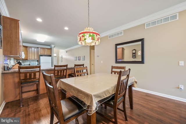 45 Harcrest Ct, Dover, DE 19901 - dining room featuring crown molding, dark wood-type flooring, and recessed lighting