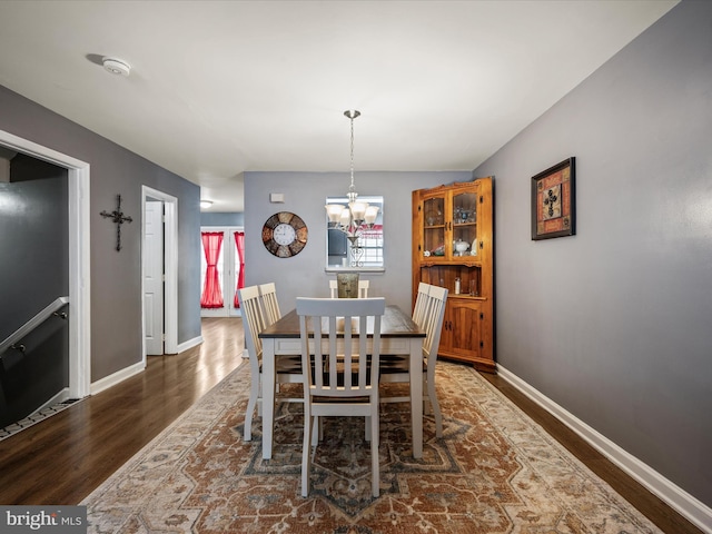 13 Mistala Ct, Inwood, WV 25428 - dining space with wood finished floors and a chandelier
