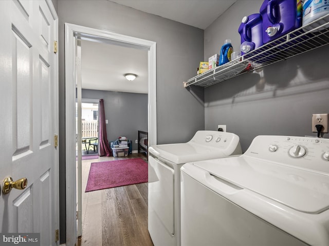 13 Mistala Ct, Inwood, WV 25428 - laundry area featuring wood finished floors and separate washer and dryer