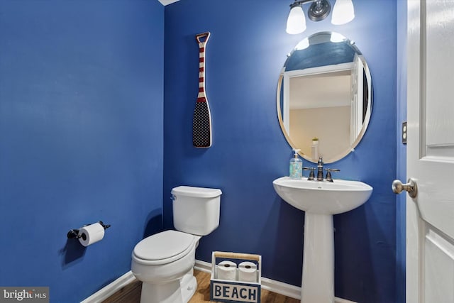 2405 Carriage Ln, Royersford, PA 19468 - half bath with toilet and wood finished floors