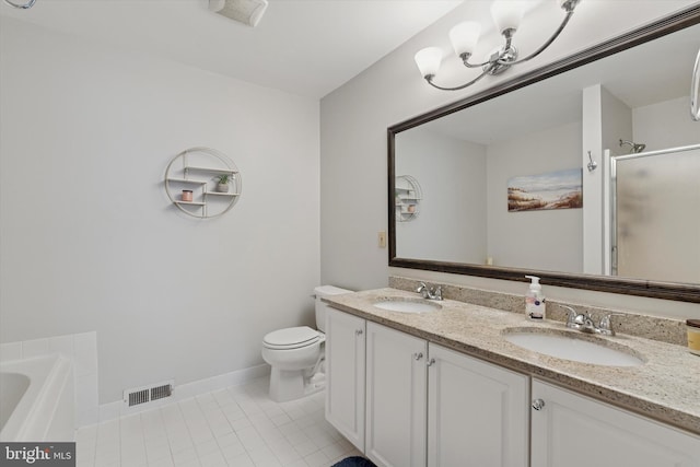 2405 Carriage Ln, Royersford, PA 19468 - full bathroom with tile patterned flooring, double vanity, a stall shower, a garden tub, and a chandelier