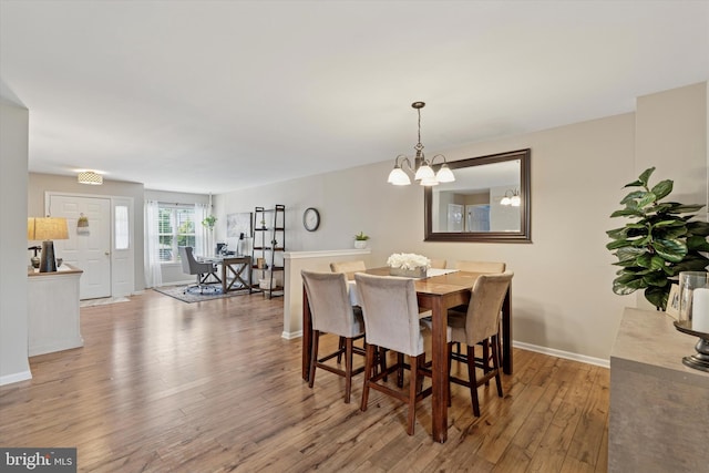 2405 Carriage Ln, Royersford, PA 19468 - dining room featuring hardwood / wood-style floors and a chandelier