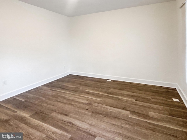 2217 Riggs Ave, Baltimore, MD 21216 - unfurnished room featuring dark wood-style floors
