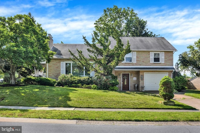 4517 Coventry Rd, Harrisburg, PA 17109 - view of front of home featuring an attached garage, a chimney, a front yard, driveway, and brick siding