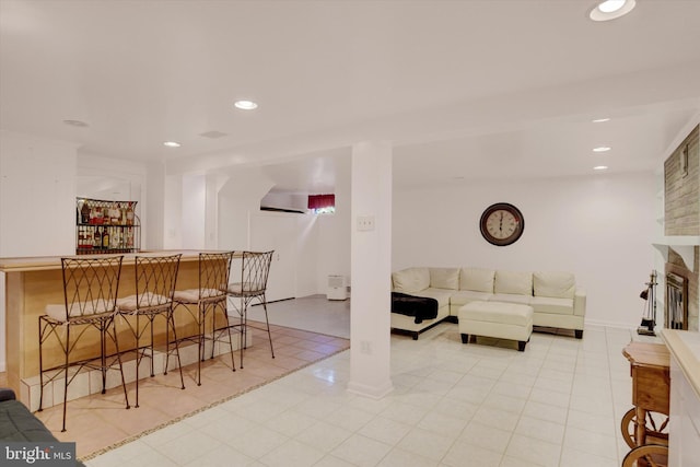 4517 Coventry Rd, Harrisburg, PA 17109 - living room with a bar, recessed lighting, a fireplace, and light tile patterned flooring