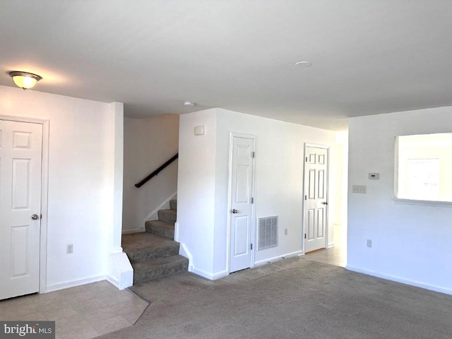 18 Kilgore Way, Bunker Hill, WV 25413 - spare room featuring stairway and carpet