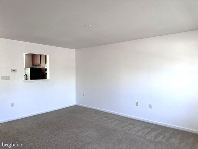 18 Kilgore Way, Bunker Hill, WV 25413 - unfurnished room with baseboards and dark colored carpet