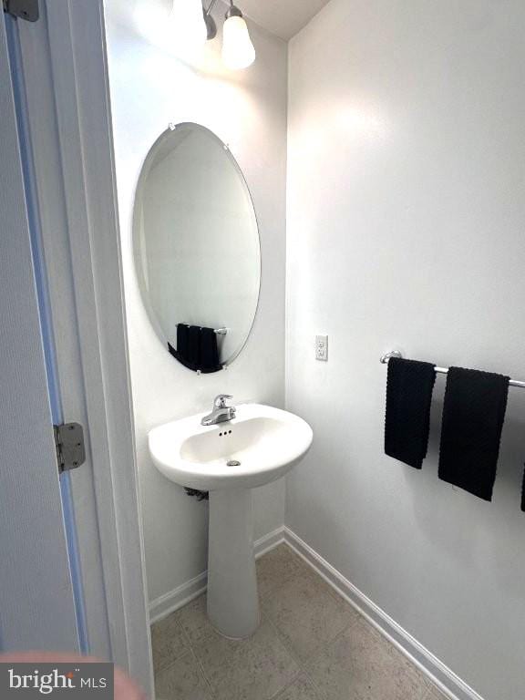 18 Kilgore Way, Bunker Hill, WV 25413 - bathroom featuring baseboards and tile patterned flooring