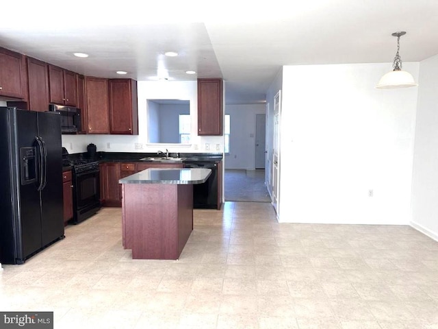 18 Kilgore Way, Bunker Hill, WV 25413 - kitchen with black appliances, dark countertops, a center island, and hanging light fixtures