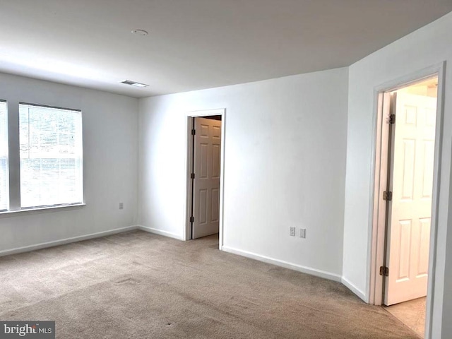 18 Kilgore Way, Bunker Hill, WV 25413 - empty room with light carpet