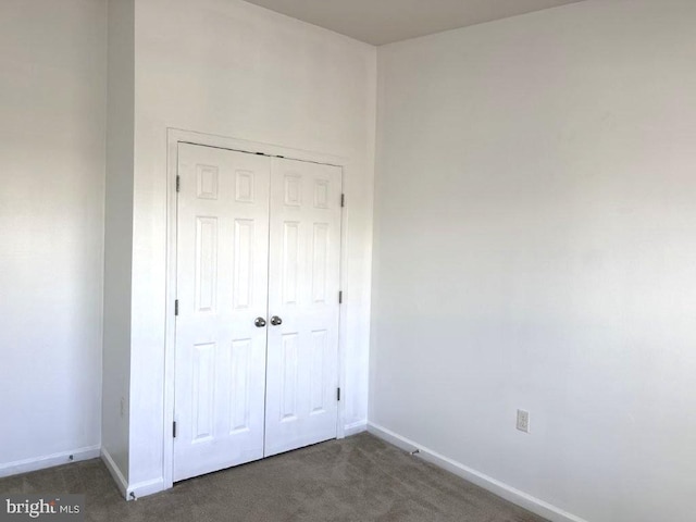 18 Kilgore Way, Bunker Hill, WV 25413 - unfurnished bedroom with dark carpet and a closet