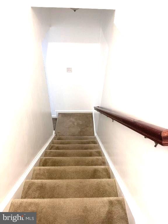 18 Kilgore Way, Bunker Hill, WV 25413 - staircase featuring baseboards